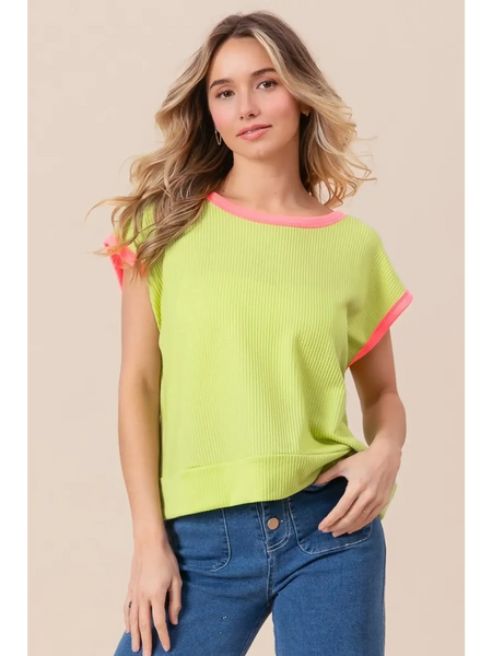 Trendsi lime and pink sleeveless shirt with ribbed texture and contrast trim worn by woman
