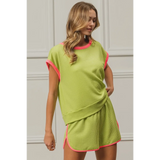 Trendsi lime and pink sleeveless shirt with matching shorts worn by woman