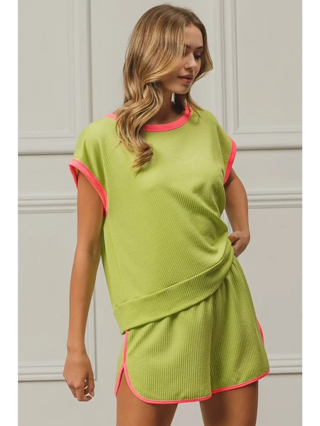 Trendsi lime and pink sleeveless shirt with matching shorts worn by woman