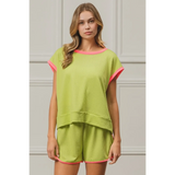 Trendsi lime and pink sleeveless shirt with relaxed fit and contrasting trim on a model