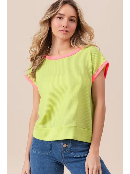 Trendsi lime and pink sleeveless shirt with ribbed texture and relaxed fit on model
