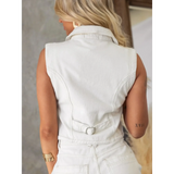 Back view of a woman wearing a white linen short set with button top by Trendsi