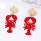 Trendsi Lobster Drop Earrings Resort with red lobster charm and gold seashell stud