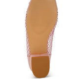 Sole view of pink mesh ballet flats for women by Rag Company showing textured rubber outsole