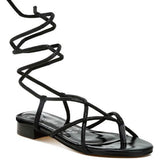 Rag Company black strappy sandals with ankle wrap design for elegant summer style