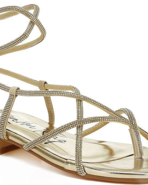 Rag Company gold strappy sandals with thin beaded straps and flat sole for stylish comfort