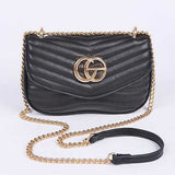 Babe Beachwear luxury GC Logo Chain Flap Bag in black with gold chain strap and quilted detail