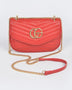 Luxury GC Logo Chain Flap Bag in red with gold chain strap and quilted design by Babe Beachwaer