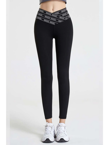 Babe Beachwear black high waisted workout leggings for women with branded waistband and white sneakers