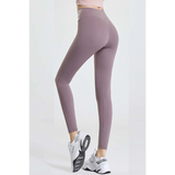 Babe Beachwear high waisted workout leggings for women in mauve color modeled with white sneakers