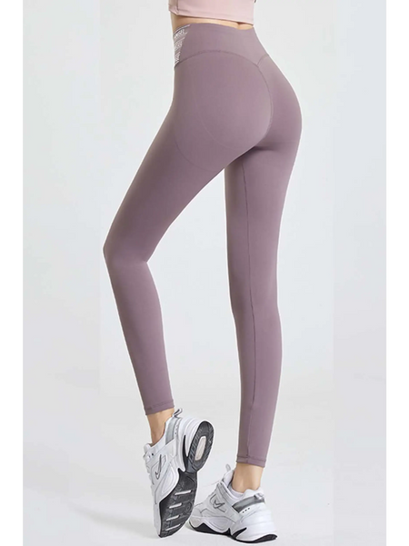 Babe Beachwear high waisted workout leggings for women in mauve color modeled with white sneakers