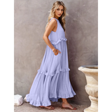 Trendsi flowy pink ruffle maxi dress with sleeveless design and tiered ruffles on a model