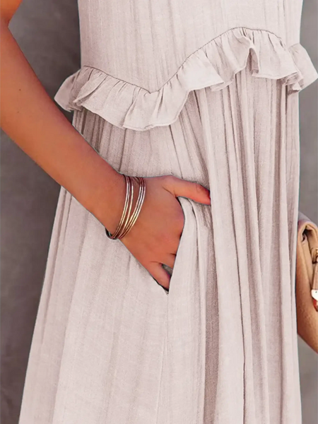 Close-up of flowy pink ruffle maxi dress by Trendsi showing side pocket and ruffle detail