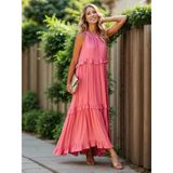Trendsi flowy pink ruffle maxi dress worn by smiling woman outdoors with sleeveless design