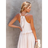 Trendsi flowy pink ruffle maxi dress with tie-back detail and lightweight fabric