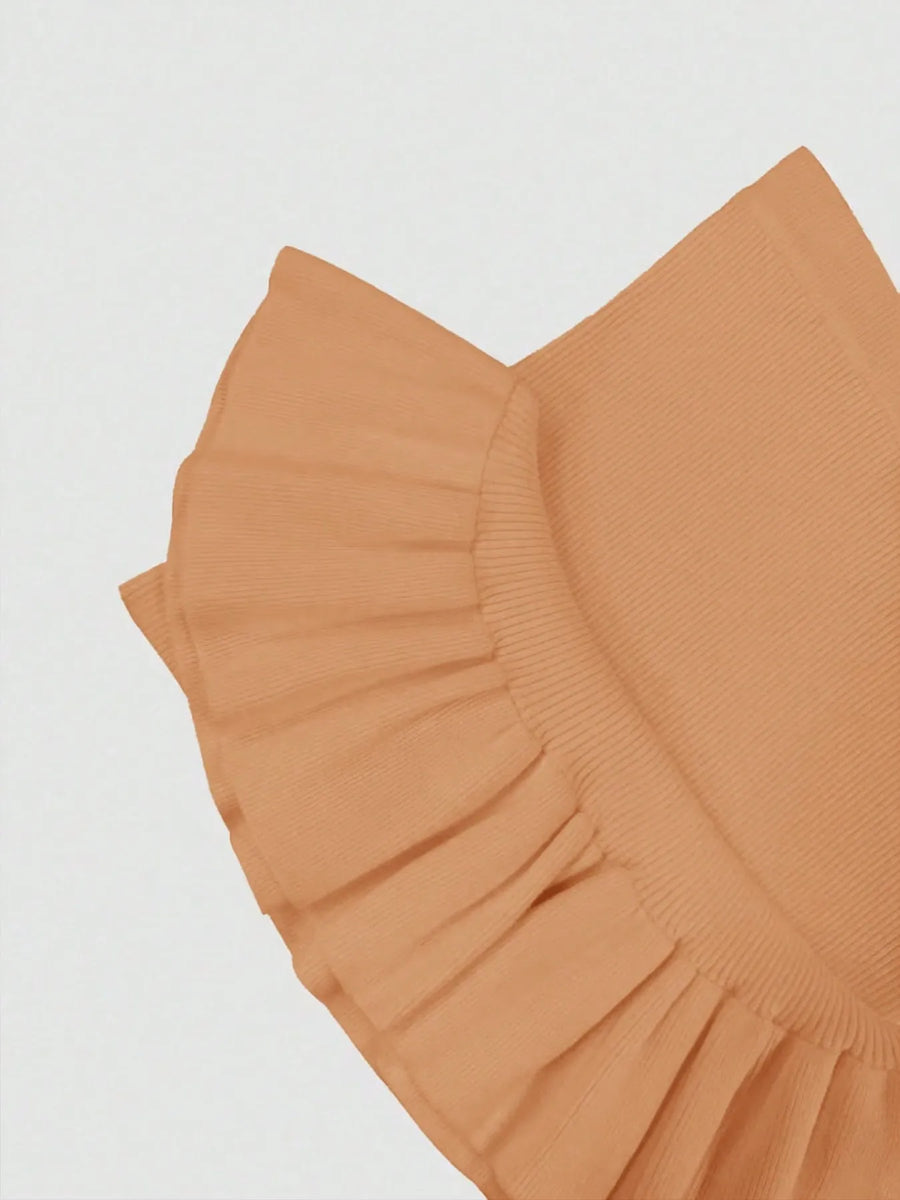 Close-up detail of ruffled sleeve on brown mermaid dress maxi dress by Trendsi