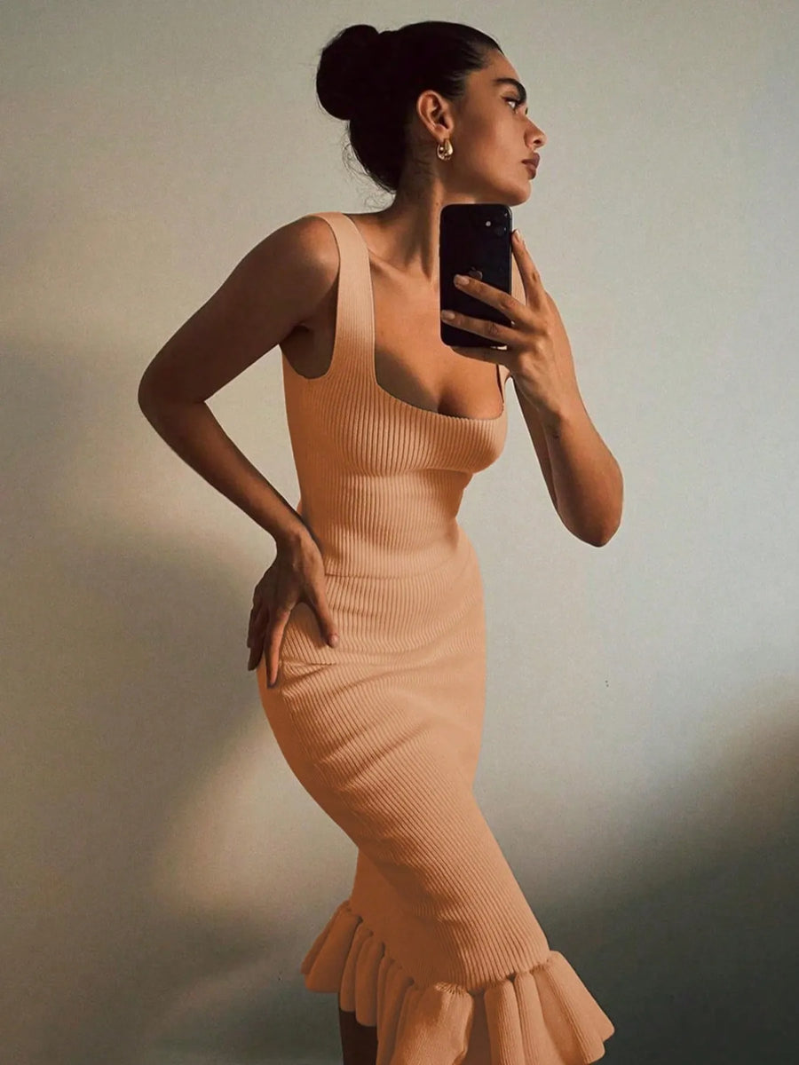 Trendsi beige ribbed mermaid dress maxi dress with ruffle hem worn by woman taking mirror selfie