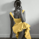 Trendsi yellow mermaid dress maxi dress with ruffled hem worn by woman taking mirror selfie