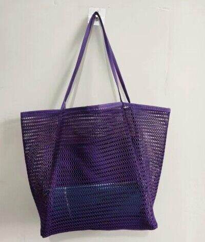 Purple Babe Beachwear Mesh Beach Bag Tote Bag with long handles hanging on wall