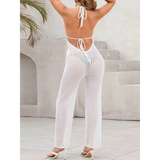 Babe Beachwear white Mesh Halter swimsuit Jumpsuit with open back and tie details on model