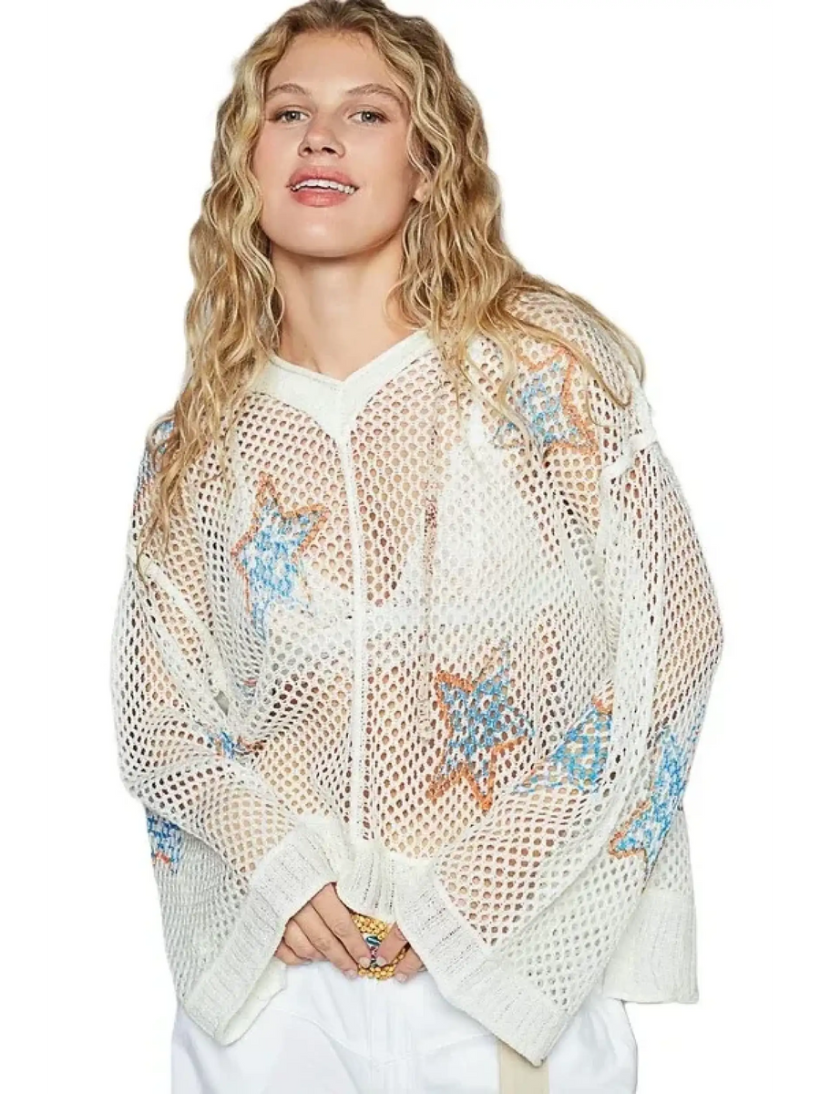 Babe Beachwear  white mesh long sleeve summer knit top with blue star patterns worn by woman
