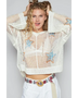Babe Beachwear  white mesh long sleeve summer knit top with colorful star embroidery worn by model