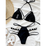 Beach Babes black two-piece swimsuit featuring strappy details Miami style swimwear for women