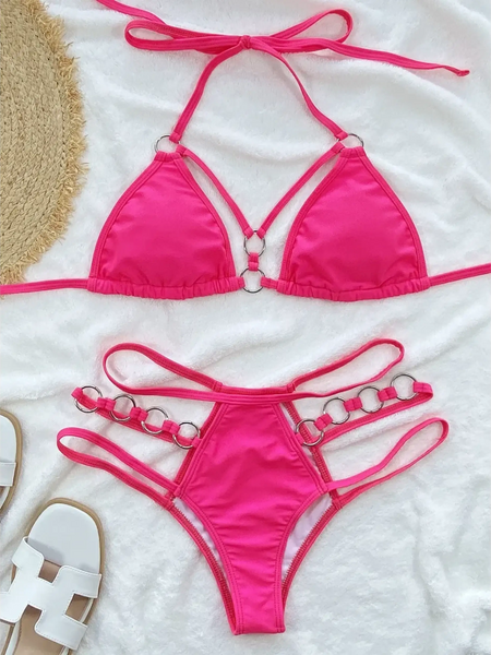 Bright pink Miami style swimwear for women by Beach Babes with strappy top and bottom on white background