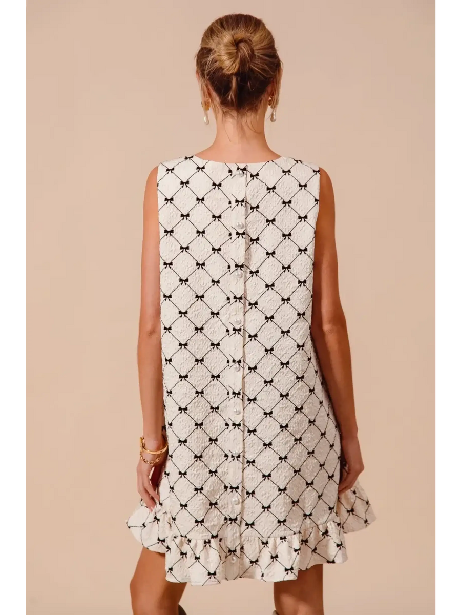 Trendsi sleeveless midi Mini Ruffle Dress with black and white geometric pattern and back button detail