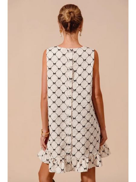 Trendsi sleeveless midi Mini Ruffle Dress with black and white geometric pattern and back button detail