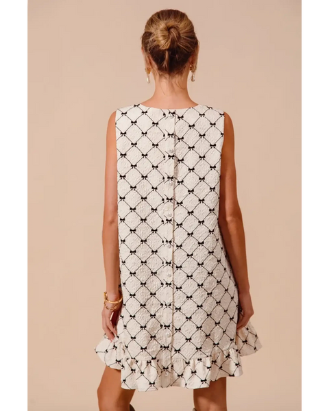 Trendsi sleeveless midi Mini Ruffle Dress with black and white geometric pattern and back button detail