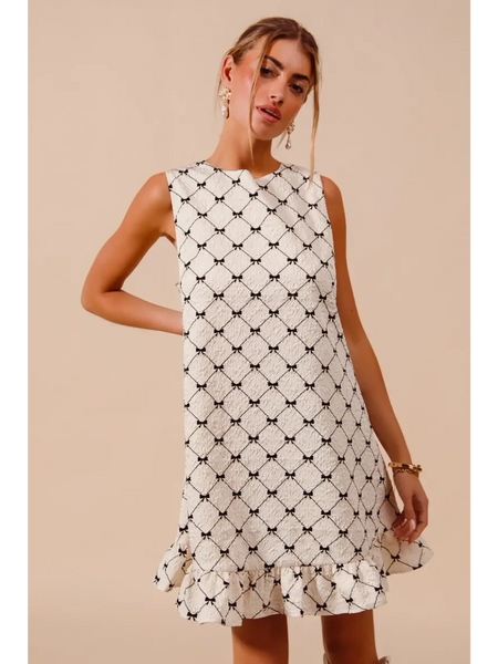 Trendsi sleeveless Mini Ruffle Dress with black geometric pattern and ruffle hem