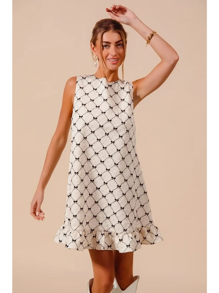 Trendsi sleeveless midi dress featuring a black and white pattern with ruffle hem Mini Ruffle Dress