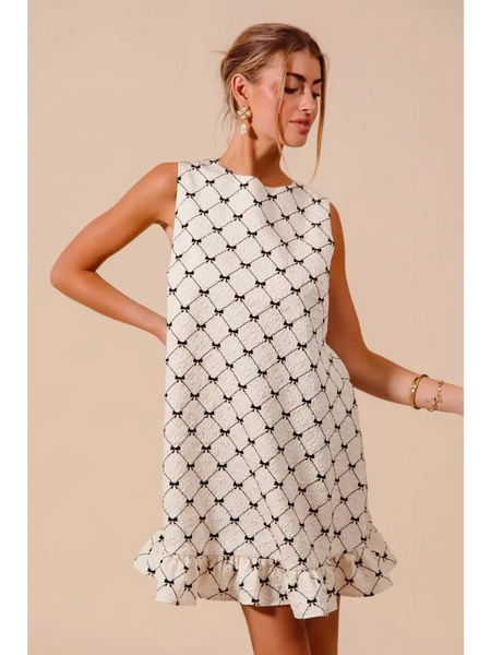 Mini Ruffle Dress sleeveless midi Mini Ruffle Dress with black and white geometric pattern and ruffled hem