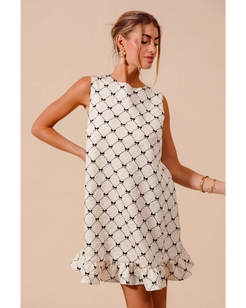 Mini Ruffle Dress sleeveless midi Mini Ruffle Dress with black and white geometric pattern and ruffled hem