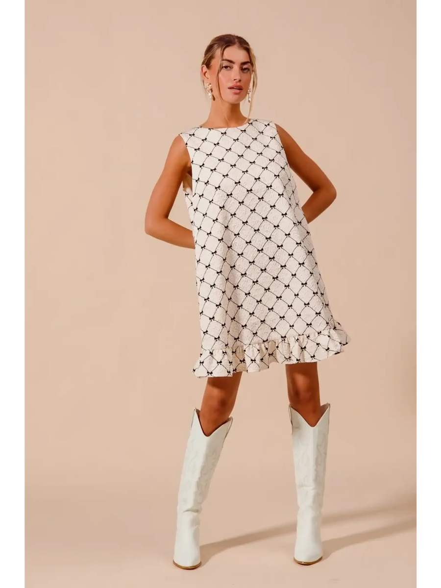 Trendsi Mini Ruffle Dress sleeveless patterned midi dress worn with white knee-high boots