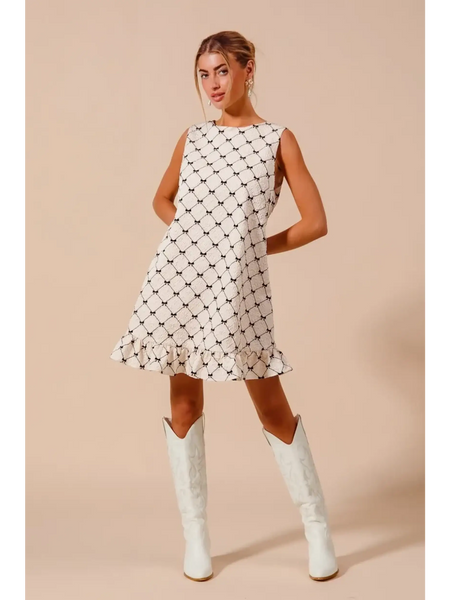 Trendsi Mini Ruffle Dress sleeveless midi dress with black pattern and white cowboy boots
