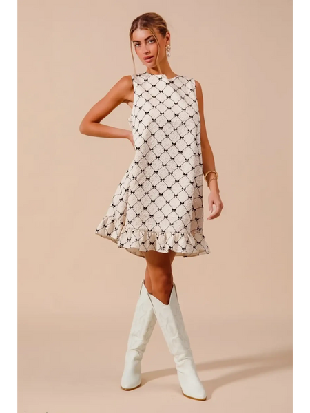 Trendsi Mini Ruffle Dress sleeveless midi dress with black diamond pattern and white knee-high boots