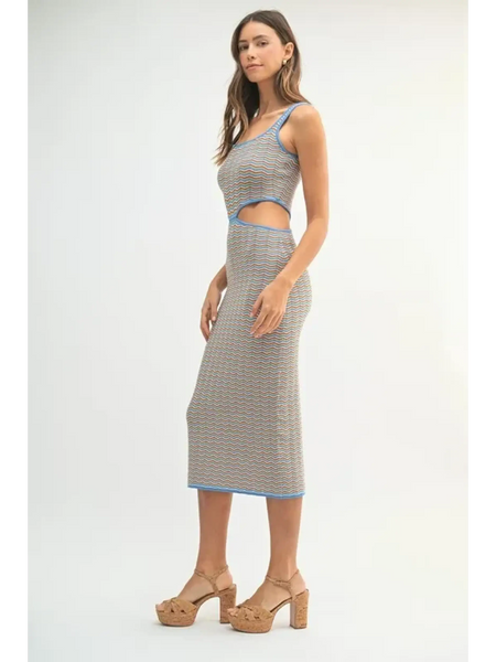 Side Cutout chevron knit bodycon midi dress with cutout sides worn by model with tan platform heels
