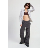 Emory Park relaxed cargo pants for women in dark gray worn with striped shirt and crop top