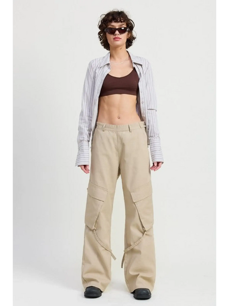 Woman wearing Emory Park relaxed cargo pants for women in beige with side pockets and a casual fit