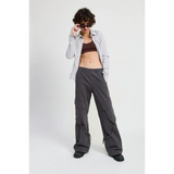 Woman wearing Emory Park relaxed cargo pants for women in gray with a striped shirt and sunglasses