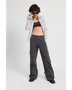 Woman wearing Emory Park relaxed cargo pants for women in gray with a striped shirt and sunglasses