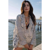 Trendsi Nautical Print Top and Shorts Set worn by woman standing by dock with ocean background