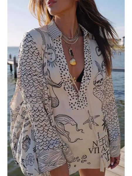 Nautical Print Top and Shorts Set by Trendsi featuring marine-themed patterns and relaxed fit perfect for beachwear