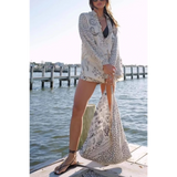 Trendsi Nautical Print Top and Shorts Set worn by a woman standing on a dock by the water