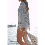 Nautical Print Top and Shorts Set by Trendsi modeled near water with sea-themed patterns
