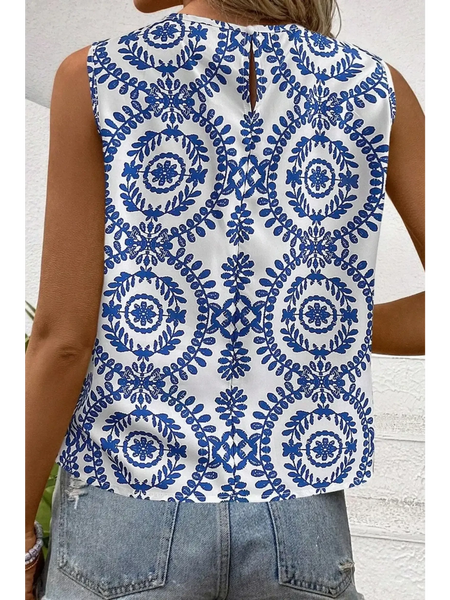 Trendsi navy blue sleeveless top for women with white background and intricate floral pattern