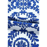 Close-up of fabric pattern on navy blue sleeveless top for women from Trendsi featuring intricate blue designs on white background