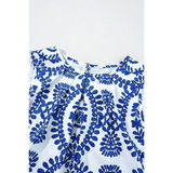 fabric Trendsi navy blue sleeveless top for women with white background and intricate floral pattern